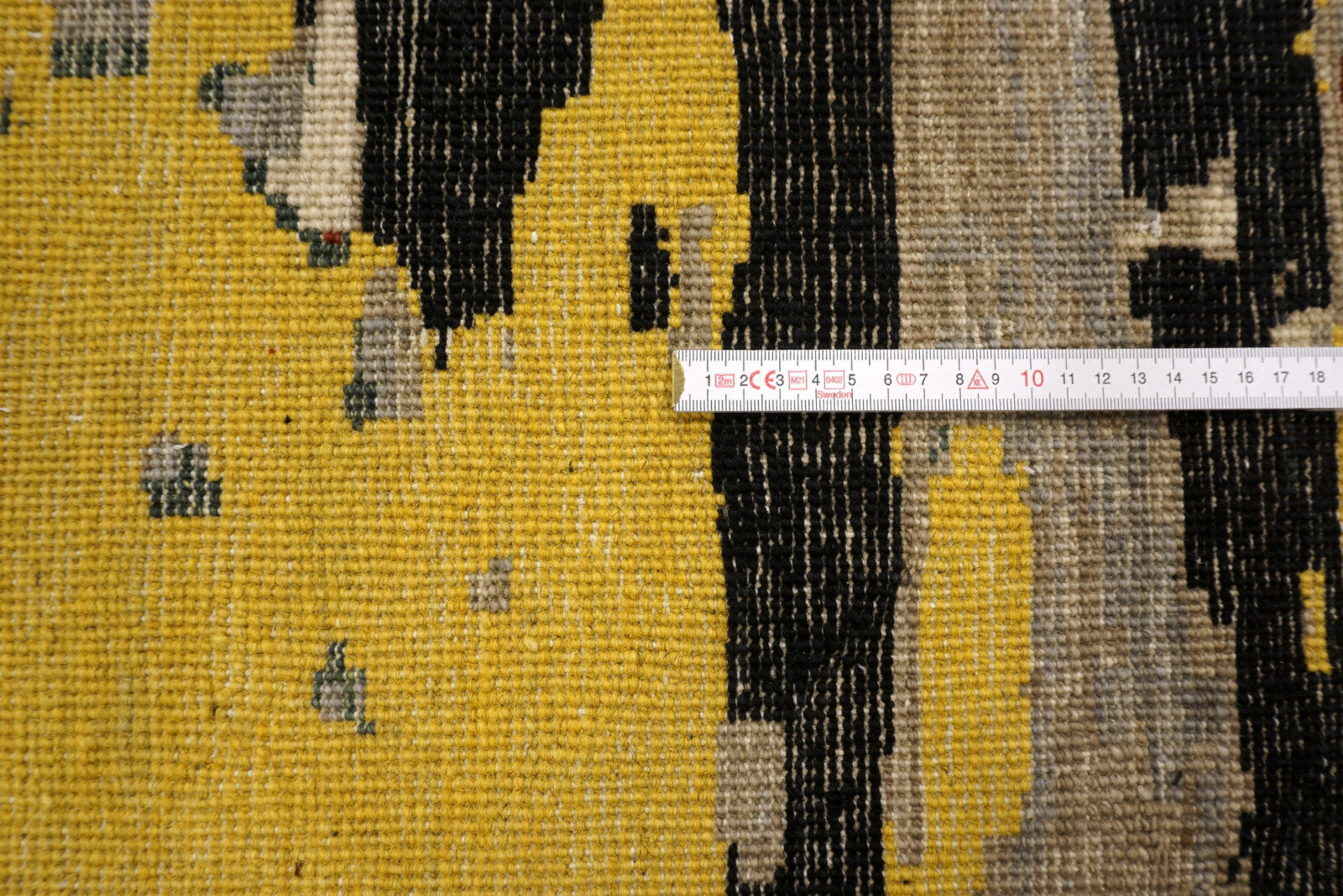Designerteppich - abstrakt in Gold, Schwarz und Creme