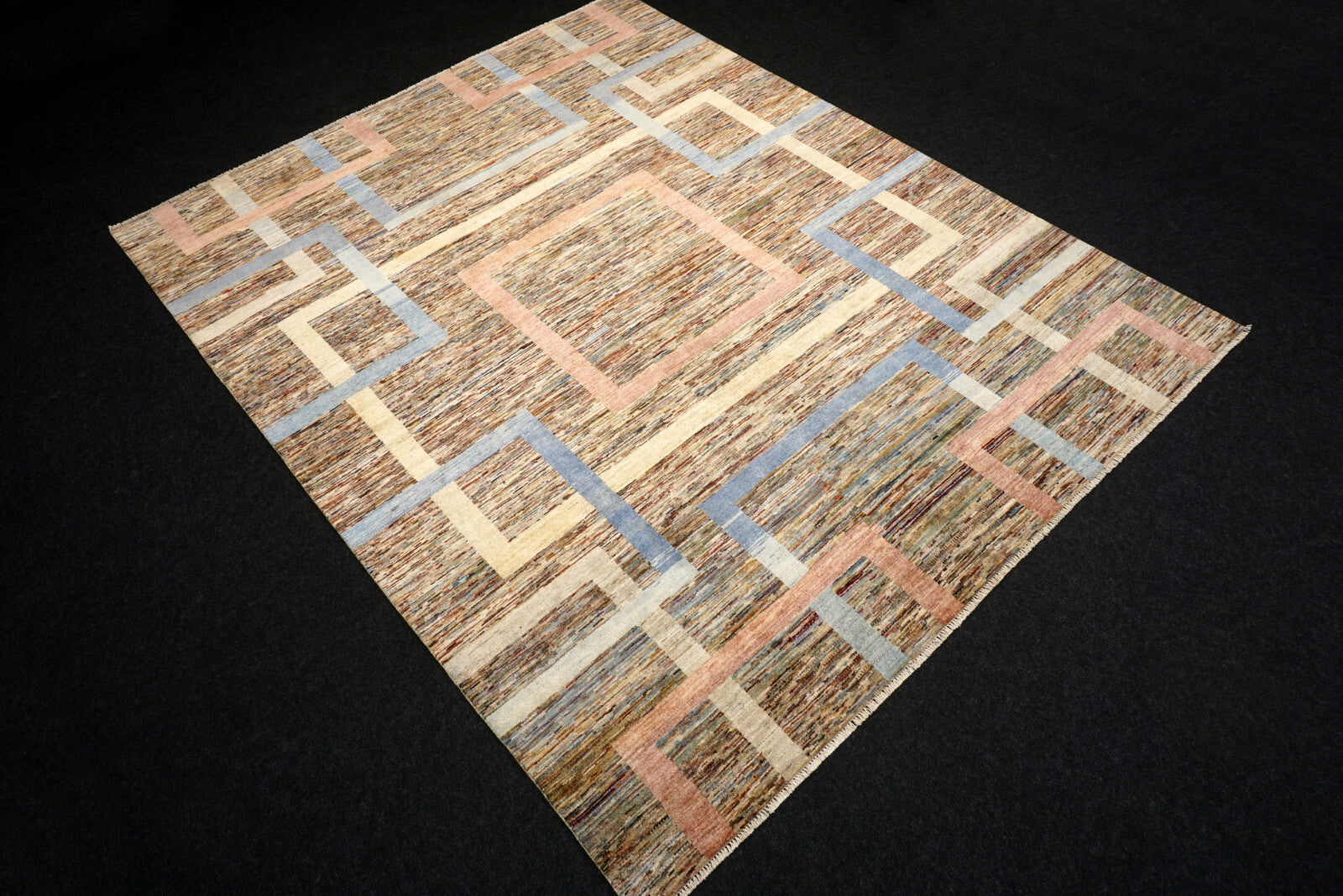 Designerteppich - geometrische Muster in Beige und Blau