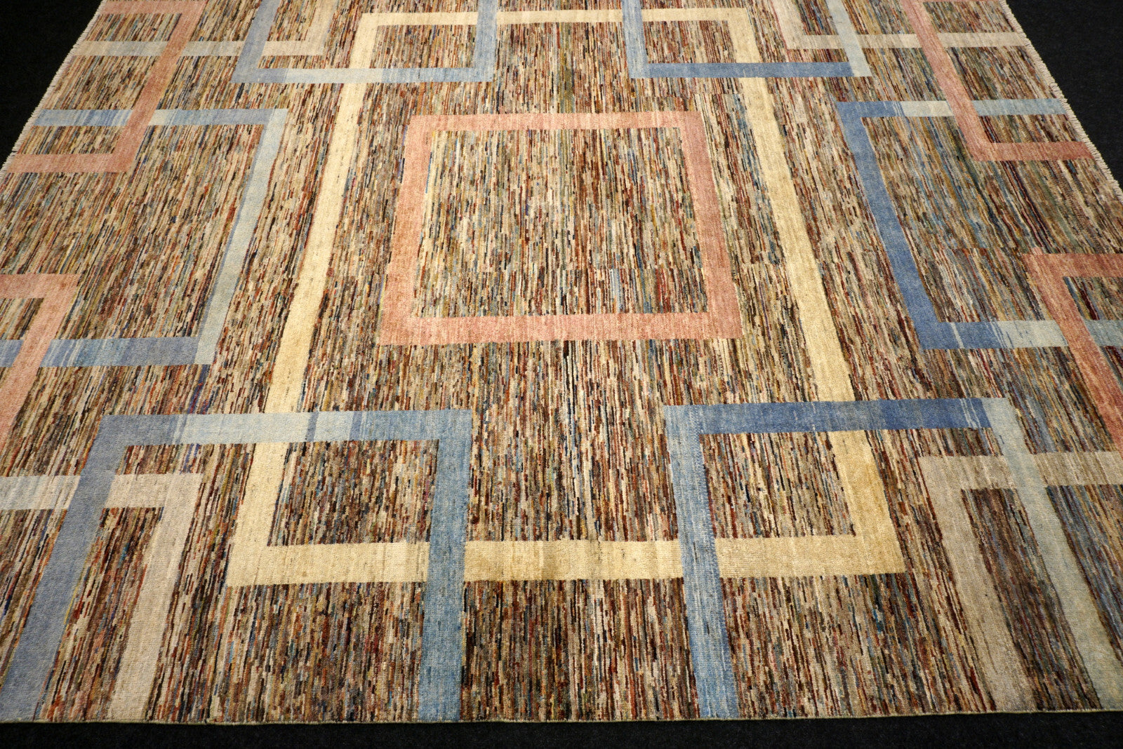 Designerteppich - geometrische Muster in Beige und Blau