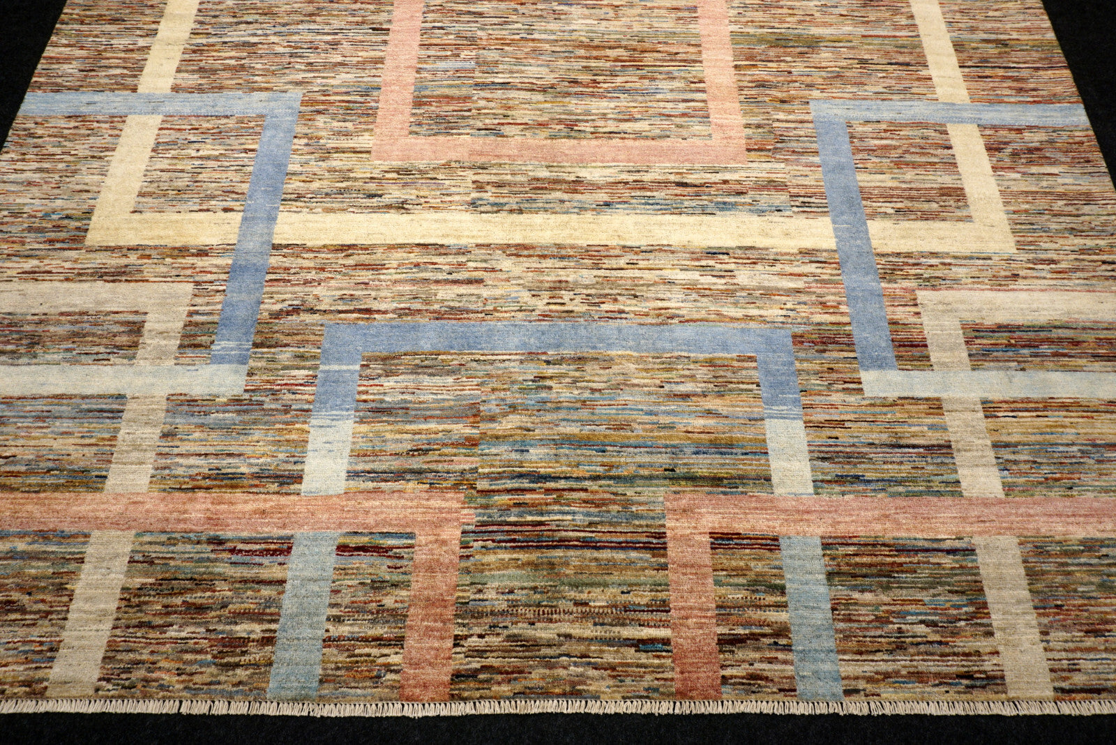 Designerteppich - geometrische Muster in Beige und Blau