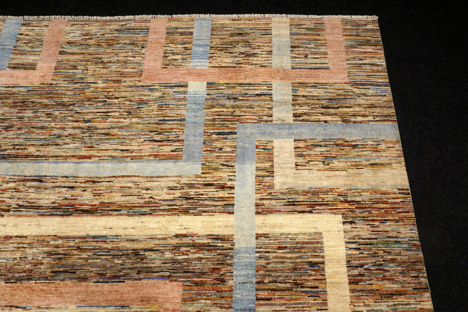 Designerteppich - geometrische Muster in Beige und Blau